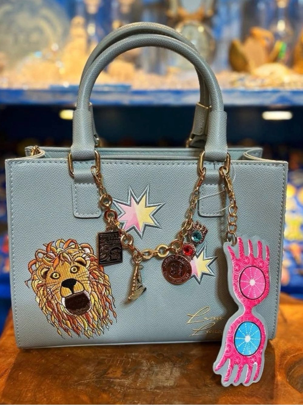 Light Blue Harry Potter Satchel Tote with Embroidered Lion & Charm